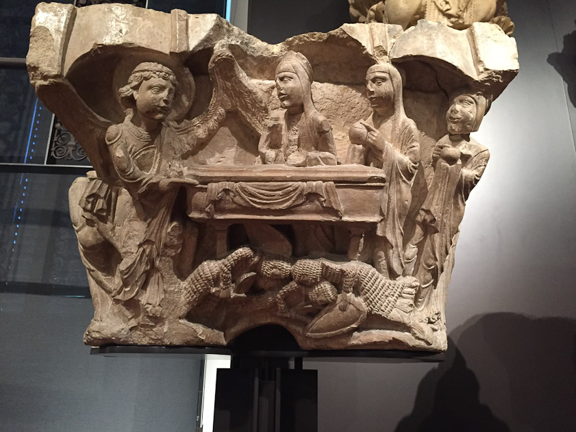 Capital from the monastery at Aguilar de Campoo showing an angel telling the two Marys that Jesus has left his tomb and ascended to heaven. Soldiers asleep under the tomb.