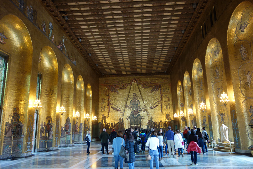 The Golden Hall is covered with gold-backed mosaic tiles made in Germany and carried in 1 sq meter pieces to Stockholm.
