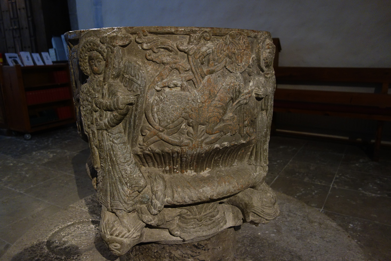 Elaboately carved font at Barlingbo.