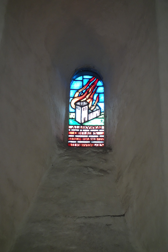 A tiny window in Ala commemorating a fire in 1938.