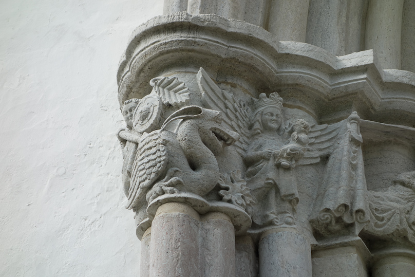 Baby Jesus has his two fingers up in the teaching gesture used in  medieval art.