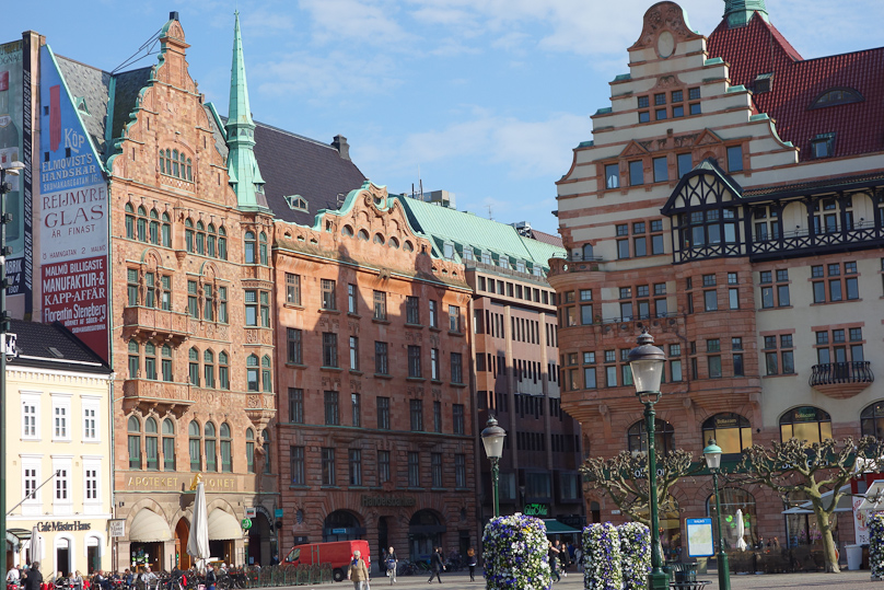 To the right of city hall is this corner of the central square called Stortorget. Note the building with the apothecary on the street level and old signs painted on its end.