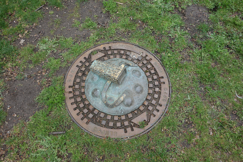 Malmö manhole cover in Kungsparken. Is this Diana's quiver?