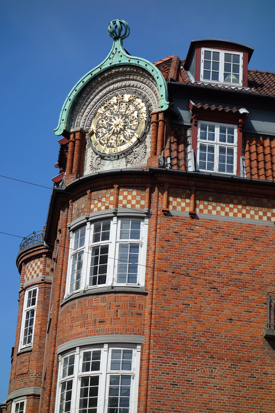 Ornate clock on building at 8 Christian IX Gade, Copenhagen, just south of Rosenborg Castle.