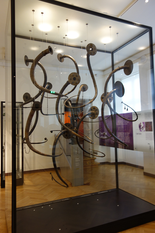 These are lurs, curved horns peculiar to the Scandinavian Bronze Age. They have been found in Denmark (39 lurs), Sweden (13), Norway (4), northern Germany (5), and Latvia (1).
