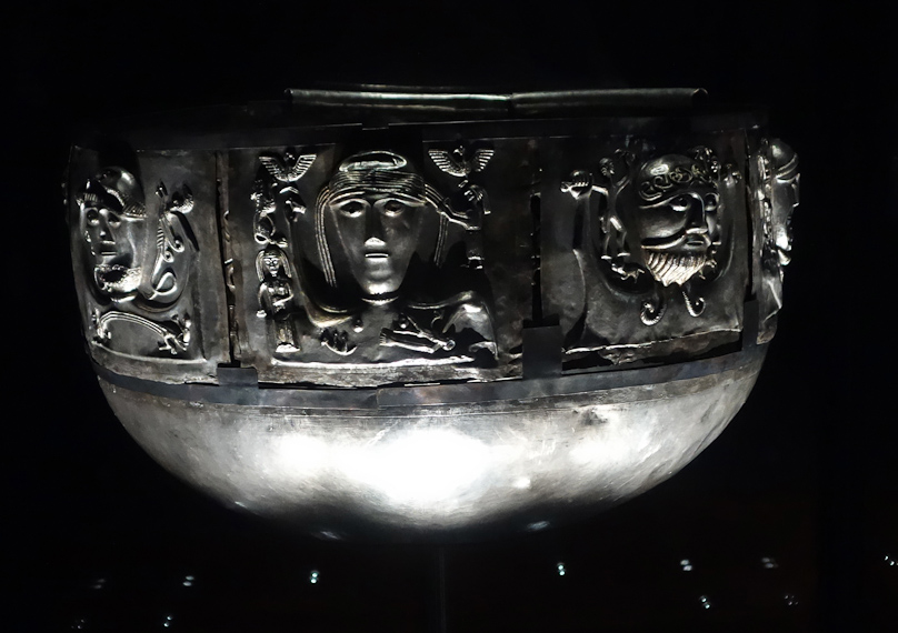 Perhaps the most amazing offering is the Gundestrup Cauldron, 27 inches in diageter and 16 inches high, made of 8 exterior plates (of which 1 is missing), five interior plates, and a round base. It is silver with some gilding.