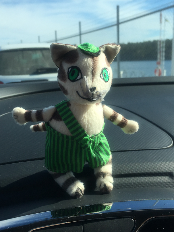 Our trip mascot in place on the dashboard on our first day of car rental at the ferry port at Nynashamn, an hour south of Stockholm.