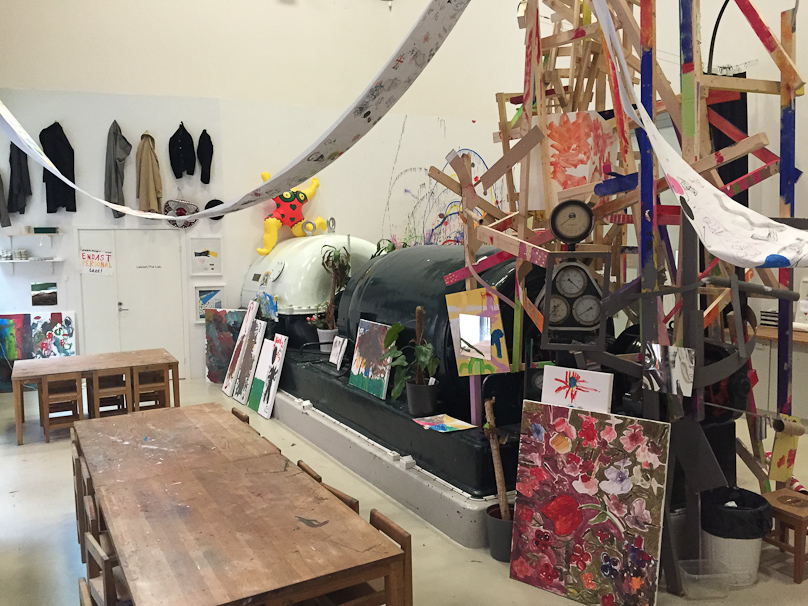 This turbine and generator are left over from the building's original use as a generating plant. The room is now used as an art workshop.