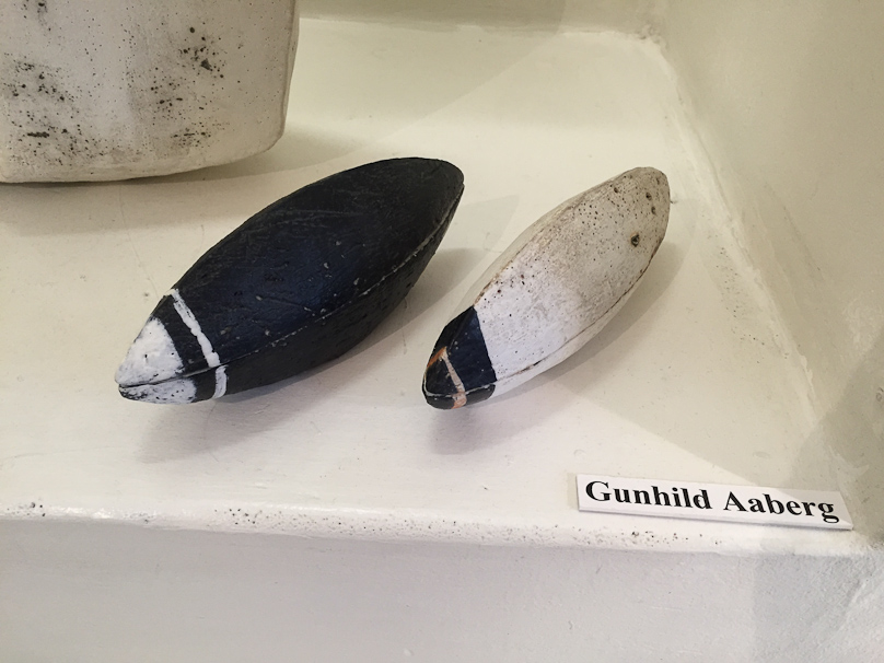 Two works by Gunhild Aaberg, boat-shaped covered boxes.